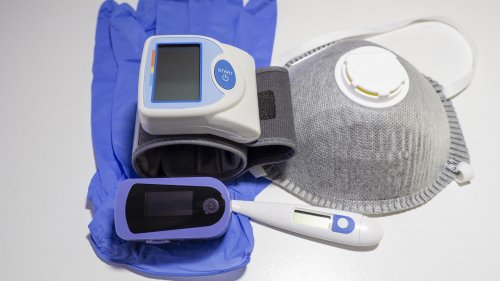 Medical kit: digital body thermometer, pulse oximeter, FFP2 face medical mask and arm blood pressure monitor. Disposable medical gloves. Kit to be used to check values during Coronavirus Covid 19